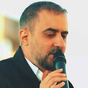 دانلود مداحی محمد حسین پویانفر به نام او می آید تکیه به دیوار حرم میزند